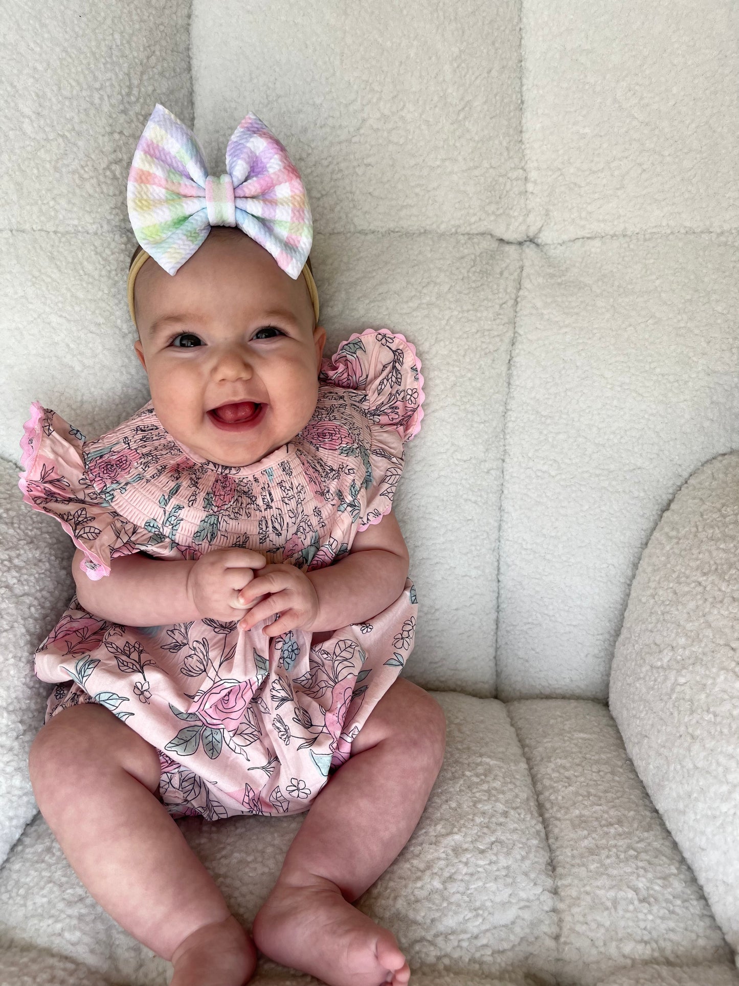 Smocked floral bubble romper